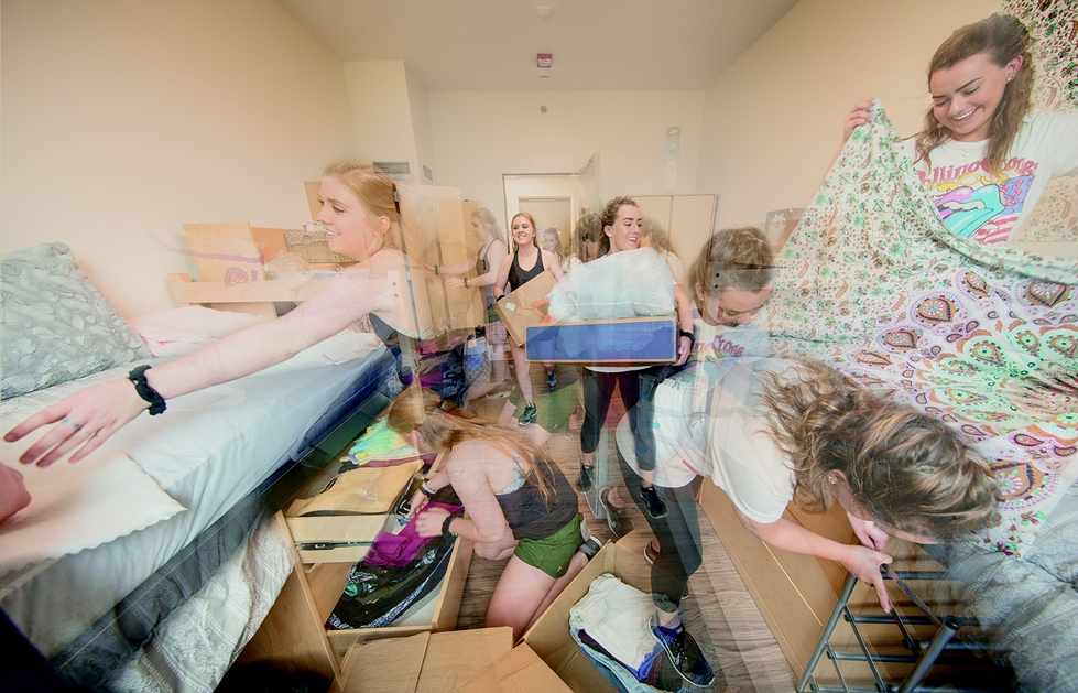 two women moving into living center room